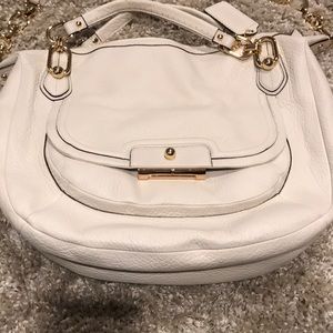 Coach white purse with gold accents
